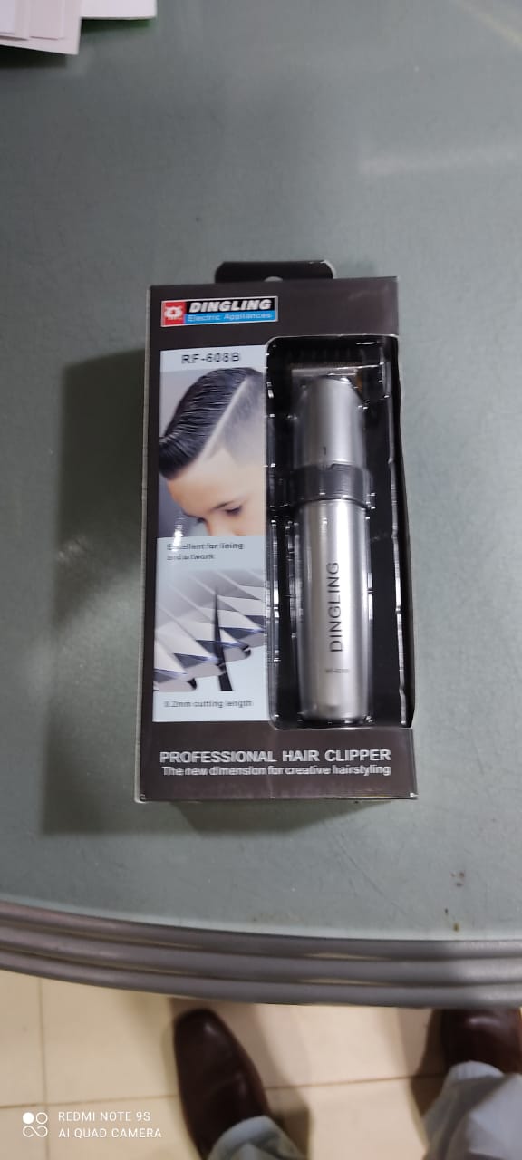 Dingling RF-608B Intelligent Professional Hair Clipper – Sleek, Cordless Precision